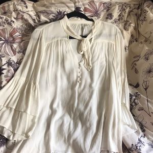 Flowing light cream colored boho top